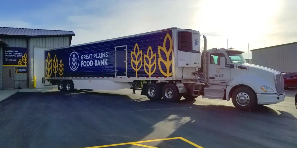 Great Plains Food Bank semi-truck featuring their logo, part of a complete rebranding project by Abovo.