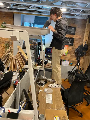 Tristan cleaning the office